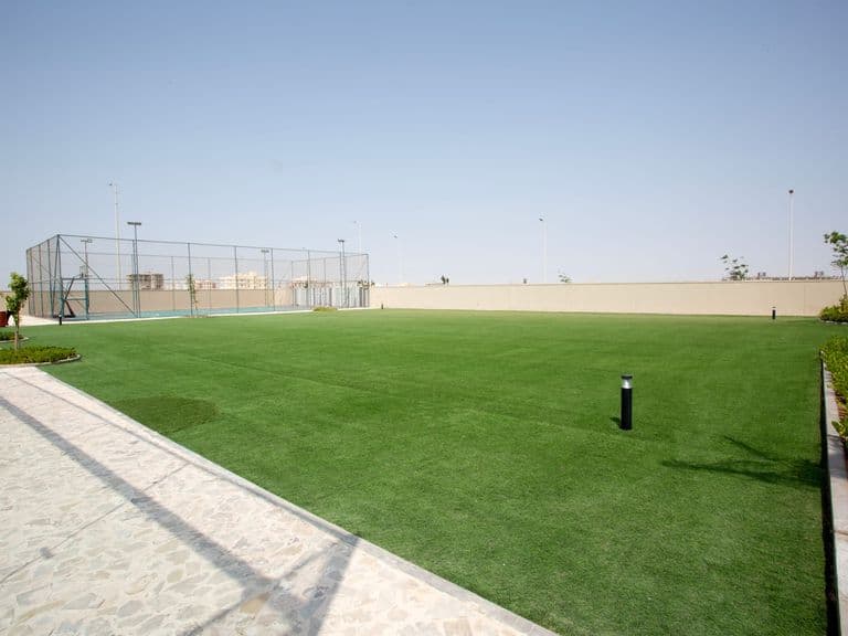 The multi-purpose recreation yard, laid with artificial turf
