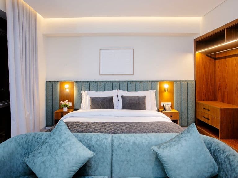 A suite bedroom with sofa