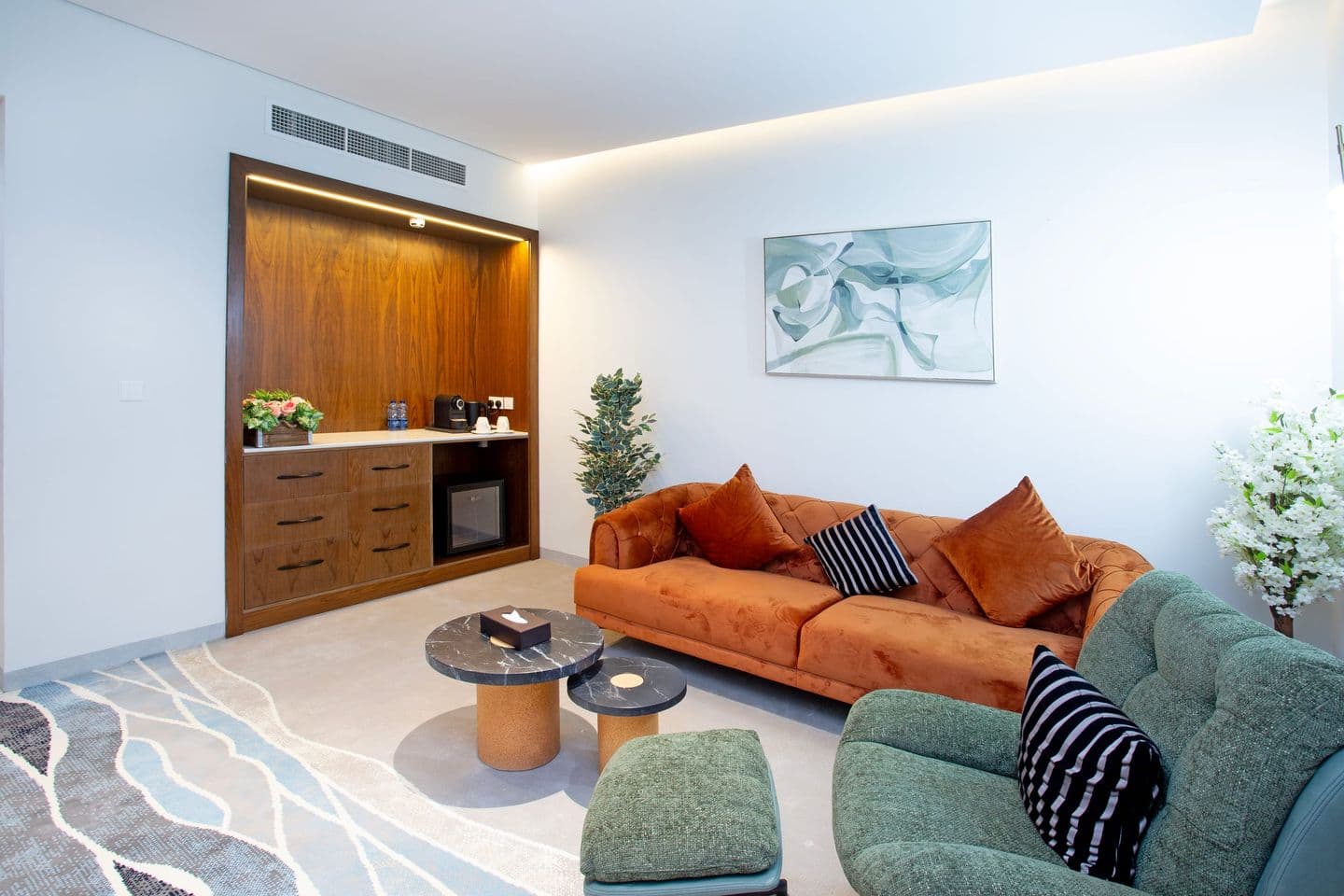 A suite living room with kitchenette