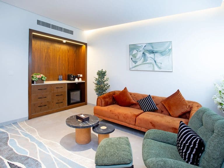 A suite living room with kitchenette