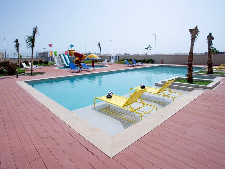 The pool terrace with sun loungers