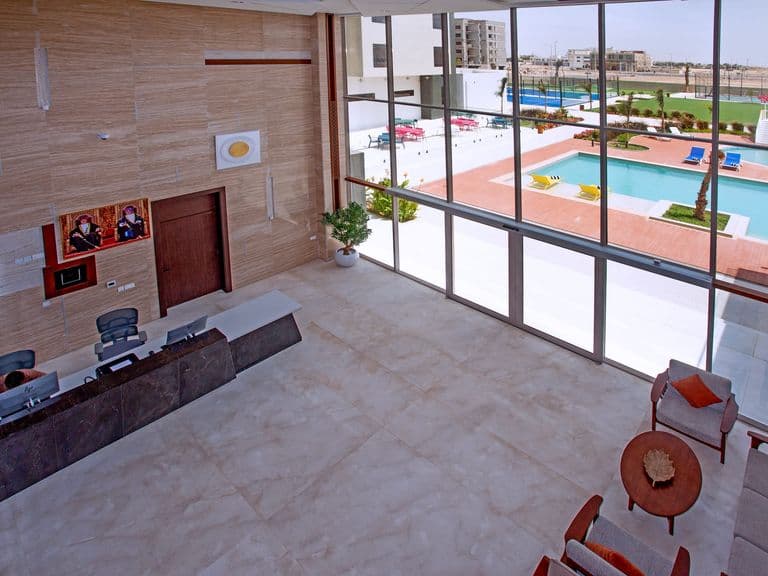 Reception, with the pool beyond the glass